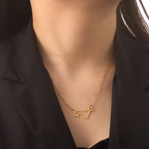 Minimalist golden dachshund outline necklace in polished stainless steel for women