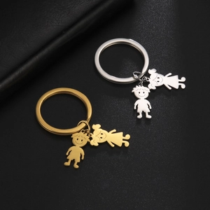 Polished stainless steel keychains with cute cartoon boy and girl silhouette pendants