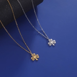 Sweet Celtic knot clover pendant necklace in gold and silver finish with cross chain