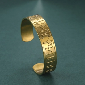 Vintage matte gold stainless steel cuff bracelet featuring engraved Nordic runes design
