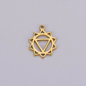 Macro shot of 18K gold plated yoga chakra pendant with geometric star design