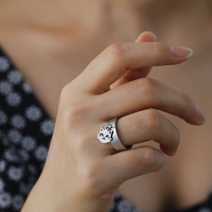 Polished stainless steel wide band ring with a cute hollow cat head charm for women