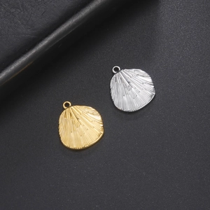 Gold and silver stainless steel shell pendants with textured radial embossed pattern