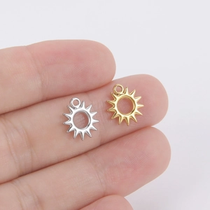 Golden and silver sunburst hollow pendant charms made of 304 stainless steel