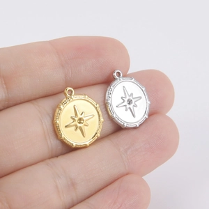 Polished stainless steel round pendant charms with embossed star patterns in gold and silver