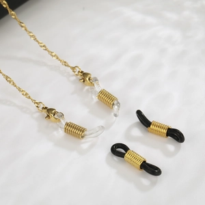 Close-up of golden water-ripple glasses chain with lobster clasps and silicone loops
