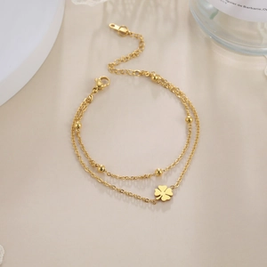 Double-layered 304 stainless steel gold bracelet with four-leaf clover charm and beads