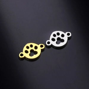 Polished stainless steel paw print jewelry connectors in gold and silver for DIY crafts