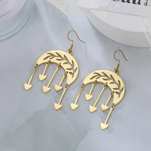 Golden crescent moon earrings with leaf textures and hanging solid heart charms