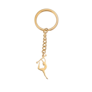 Porte-clés en acier titane doré avec une figurine élégante de gymnastique rythmique