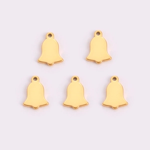 Detailed view of five polished gold stainless steel bell charms for DIY jewelry making