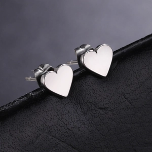 Minimalist heart-shaped stainless steel stud earrings with mirror polished finish