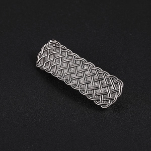 Vintage silver Celtic knot hair clip with intricate weave pattern and metal finish