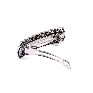 Vintage silver alloy spring hair clip with woven texture for elegant styling