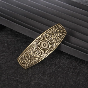 Vintage bronze Celtic knot hair clip with sun relief pattern in retro Viking style