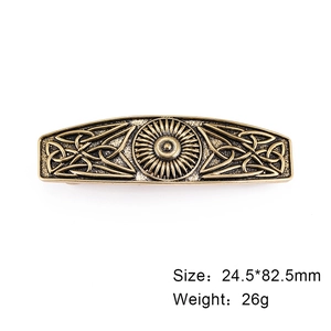 Vintage Celtic knot hair clip in bronze finish with sunburst design on white background