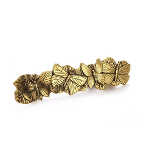Antike Goldlegierung Schmetterling Haarklammer mit filigranen Details auf weißem Grund