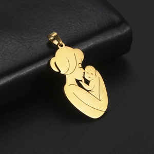 Detailed view of a gold-plated stainless steel pendant featuring a mother and child silhouette