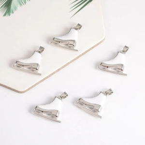Set of five white enamel ice skate charms with silver metal blades for DIY jewelry making