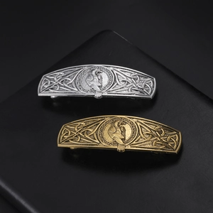 Viking eagle hair clips with Celtic knot design in antique silver and gold finishes