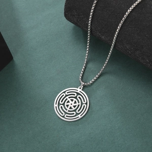 Stainless steel Hecate's Wheel pendant necklace with box chain on dark green background