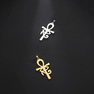 Détails des pendentifs Croix d'Ankh et Œil d'Horus en acier doré et argenté