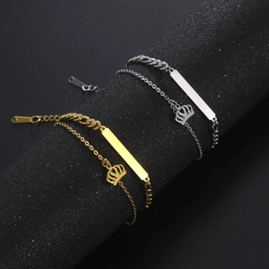 Minimalist stainless steel bracelet set with rectangular bar and crown pendants in gold and silver