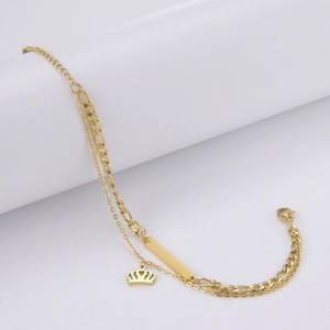 Gold double-layer bracelet with crown pendant and engravable rectangular bar plate