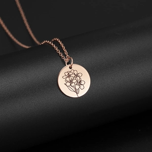 Collana in acciaio inossidabile oro rosa con ciondolo a cerchio inciso e catena a maglie