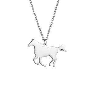 Macro detail of a silver running horse pendant on a stainless steel link chain