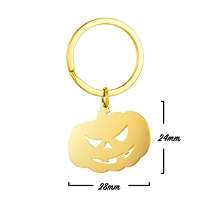 Golden stainless steel Halloween pumpkin keychain with hollowed-out face design