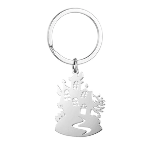 Detailed macro view of a silver stainless steel keychain featuring a hollow witch house