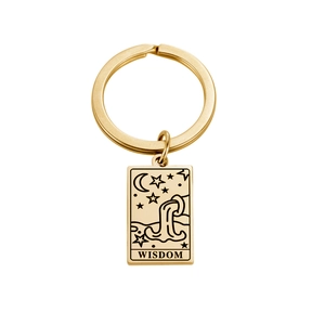 Detail of 18K gold plated stainless steel Tarot keychain with engraved Wisdom and crescent moon