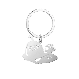 Polished stainless steel RIP gravestone keychain with gothic bone and shovel design