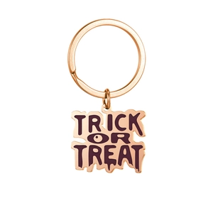 Détail du porte-clés Trick or Treat en or rose avec design Halloween à effet fondant
