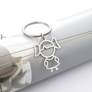 Minimalist stainless steel keychain featuring a hollowed-out cute girl silhouette design