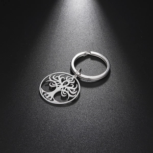 Modern stainless steel tree of life keychain with intricate hollow cut-out design