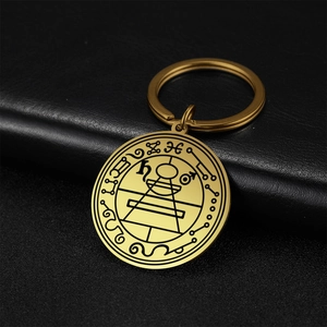 Golden stainless steel Solomon seal amulet keychain with geometric engraving on leather