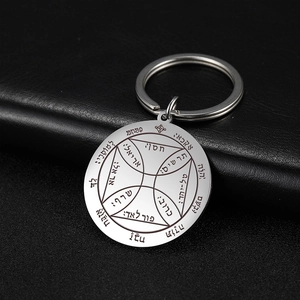 Detailed close-up of tarot sun series stainless steel keychain with Hebrew engraving