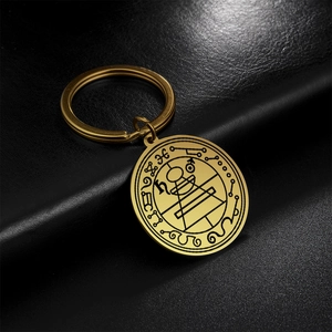 Gold Solomon seal amulet keychain with geometric engraving on brushed stainless steel