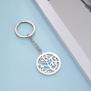 Polished stainless steel keychain featuring a hollow round rose flower pendant on blue base