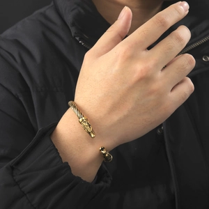 Bracciale rigido retrò in acciaio inossidabile con teste di lupo e trama a corda ritorta
