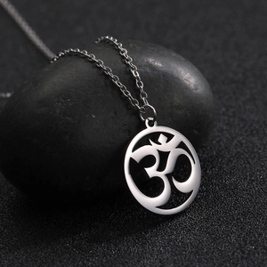 Polished stainless steel Om pendant necklace on black pebble with a sleek O-chain link