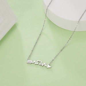 Detailed view of silver stainless steel arrow necklace with MOM heart pendant design