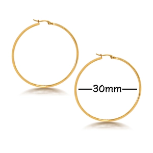 Detailed view of 30mm gold hoop earrings with mirror finish on white background