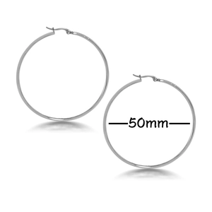 Detail of 50mm silver hoop earrings showing size measurement and high polish finish