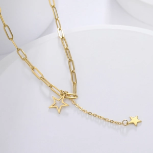 Double star pendant necklace with golden paperclip chain and solid star charm