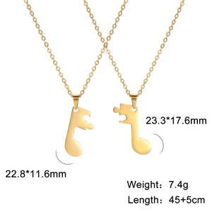 Detail view of musical note puzzle necklaces with precise dimensions and weight