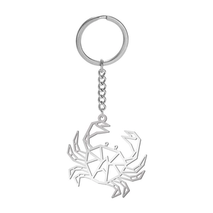 Polished stainless steel crab keychain featuring geometric hollow design and initial A
