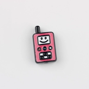 Pink walkie-talkie style acrylic bead with a smiley face design for DIY jewelry making